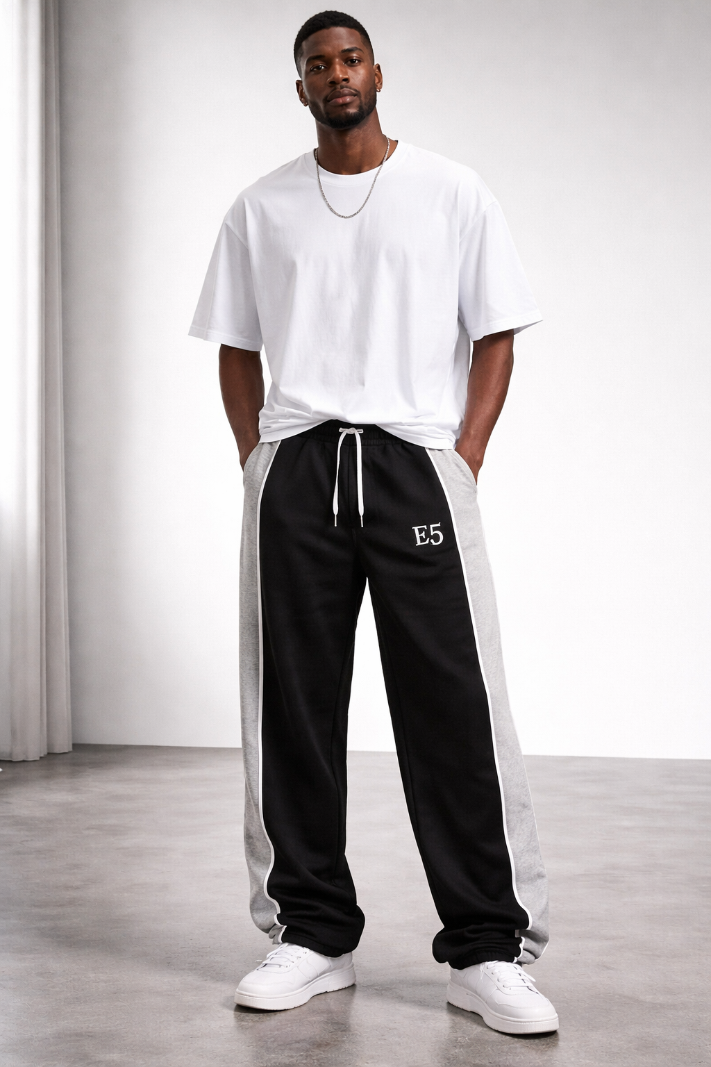 BLACK AND GREY JOGGERS.